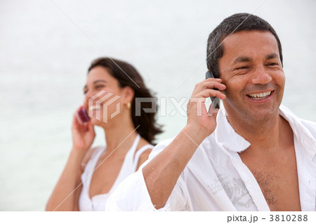 Couple on the phone Couple on the phone 3810288
