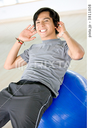 gym man doing pilates gym man doing pilates 3811808