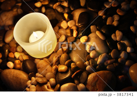 Candle and Rocks 3817341