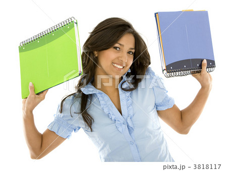 Student smiling with notebooks 3818117