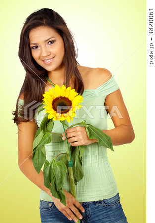casual girl with a sunflower 3820061