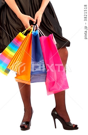girl holding shopping bags girl holding shopping bags 3821518