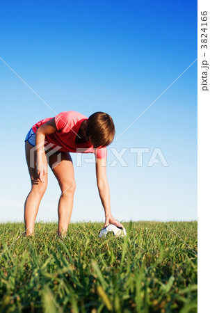 Young Woman Playing Soccer Young Woman Playing Soccer 3824166