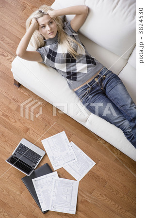 Young Woman Doing Taxes 3824530
