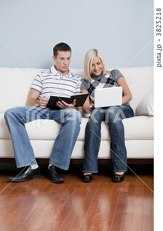 Couple Relaxing on Couch 3825218