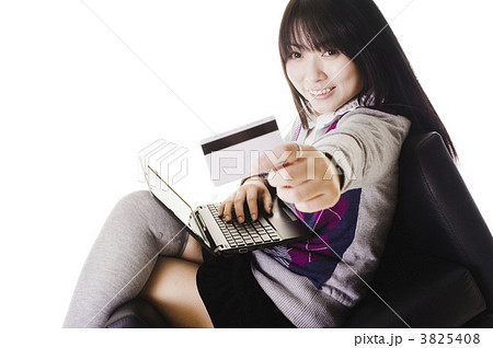 Chinese student showing off a credit card. 3825408