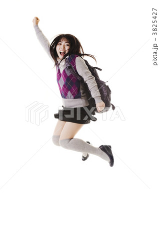Chinese school girl jumping into air. 3825427