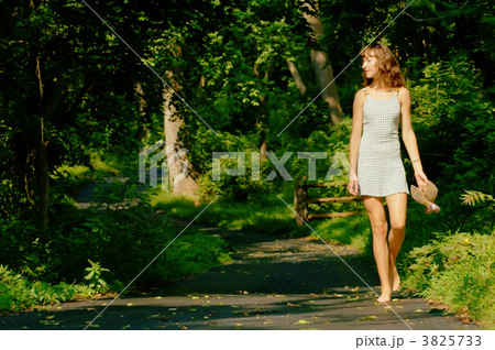 Pretty girl on forest path 3825733