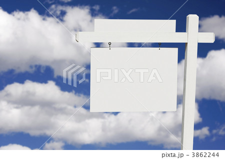Blank Real Estate Sign on Clouds & Sky Background 3862244