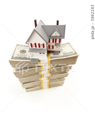 Small House on Stacks of Hundred Dollar Bills Small House on Stacks of Hundred Dollar Bills 3862283