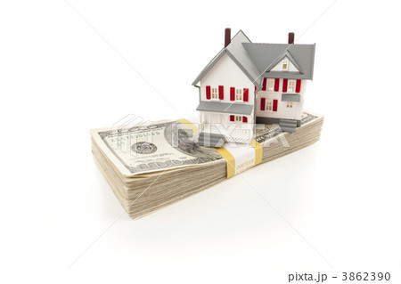 Small House on Stack of Hundred Dollar Bills Small House on Stack of Hundred Dollar Bills 3862390