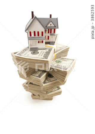 Small House on Stacks of Hundred Dollar Bills Small House on Stacks of Hundred Dollar Bills 3862593