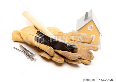 Hammer, Gloves, Nails and House Hammer, Gloves, Nails and House 3862730