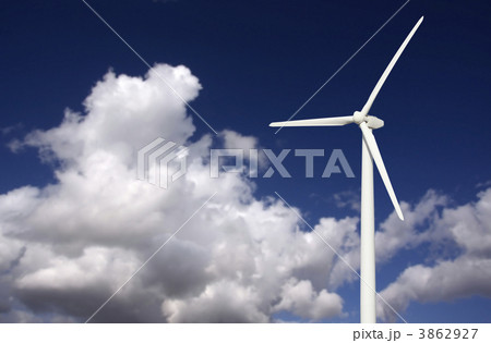 Wind Turbine Over Dramatic Sky and Clouds 3862927