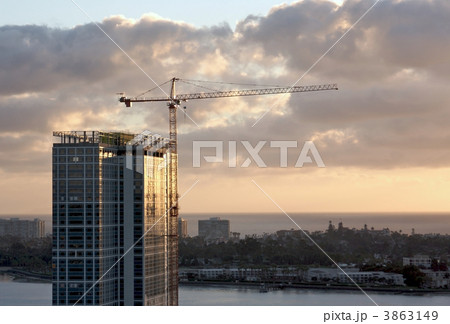 Silhouette of Crane and Building Silhouette of Crane and Building 3863149