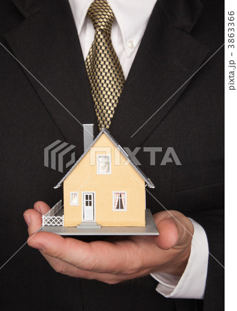 Businessman Holding House Businessman Holding House 3863366