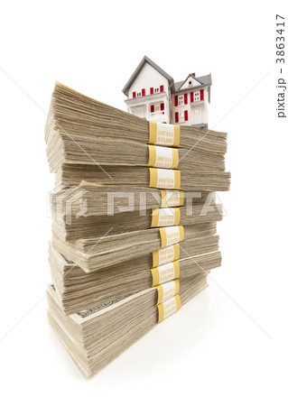 Small House on Stacks of Hundred Dollar Bills Small House on Stacks of Hundred Dollar Bills 3863417