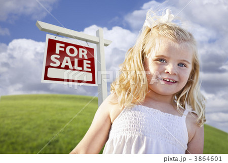 Smiling Cute Girl in Field with For Sale Real Estate Sign Smiling Cute Girl in Field with For Sale Real Estate Sign 3864601