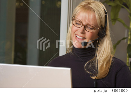 Attractive Businesswoman with Phone Headset 3865809