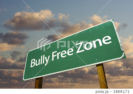 Bully Free Zone Green Road Sign and Clouds Bully Free Zone Green Road Sign and Clouds 3866171