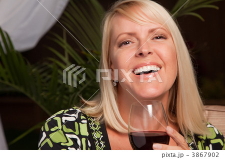 Beautiful Blonde Woman Enjoying Wine 3867902
