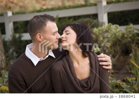 Attractive Couple Portrait in Park Attractive Couple Portrait in Park 3868041