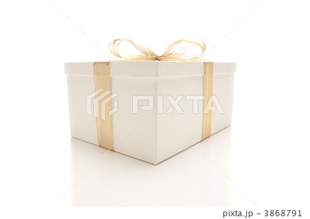White Gift Box with Gold Ribbon Isolated White Gift Box with Gold Ribbon Isolated 3868791