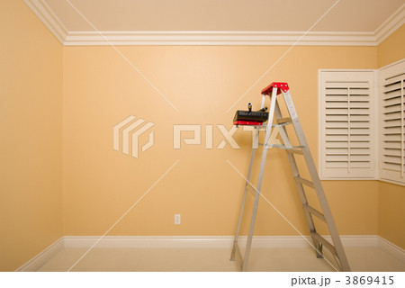 Empty Room with Ladder, Paint Tray and Rollers 3869415
