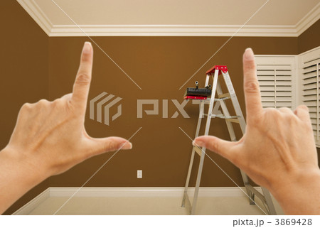 Hands Framing Brown Painted Wall Interior Hands Framing Brown Painted Wall Interior 3869428
