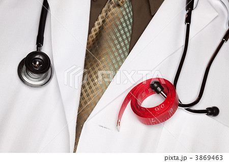 Doctor with Stethoscope and Measuring Tape 3869463