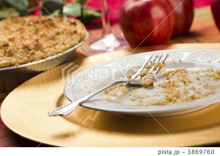 Apple Pie and Empty Plate with Remaining Crumbs Apple Pie and Empty Plate with Remaining Crumbs 3869760