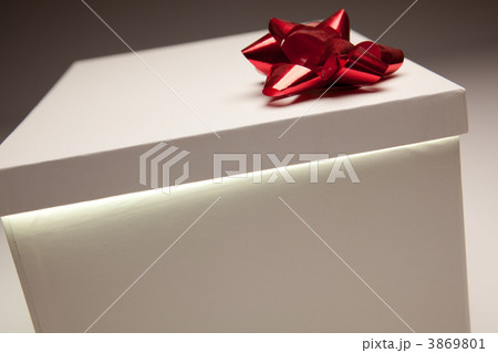 Red Bow Gift Box Lid Showing Very Bright Contents 3869801