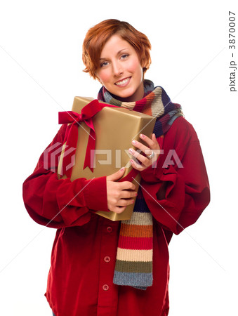 Pretty Red Haired Girl with Scarf Holding Wrapped Gift Pretty Red Haired Girl with Scarf Holding Wrapped Gift 3870007