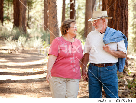 Loving Senior Couple Walking Together 3870568