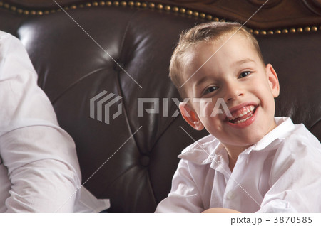 Adorable Young Boy Smiles Adorable Young Boy Smiles 3870585