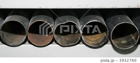 Row of metal tubes Row of metal tubes 3932760