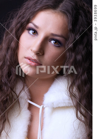 Young pretty girl close-up portrait in fur coat Young pretty girl close-up portrait in fur coat 3938699