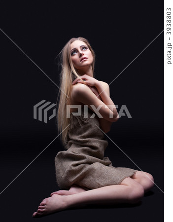 Young girl in sadness look on light with hope Young girl in sadness look on light with hope 3938803