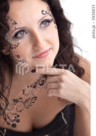 Woman face with paint close-up portrait Woman face with paint close-up portrait 3938833