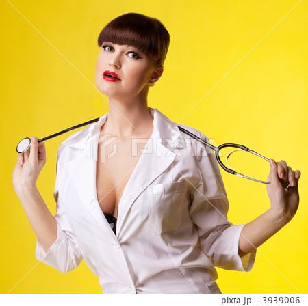 Sexual woman in nurse suit with stethoscope 3939006