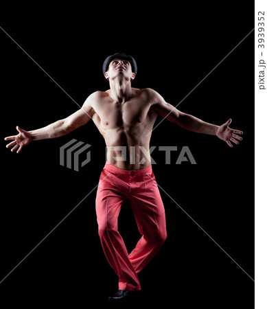 young naked man dance striptease in red costume 3939352