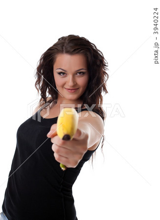 young woman shoot with banana gun 3940224