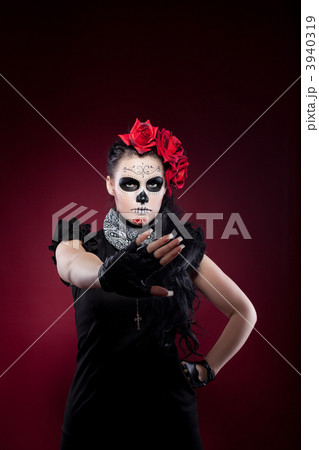 funny woman in day of the dead mask stop sign 3940319