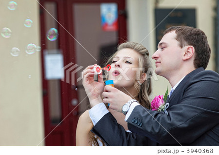 just married couple blow bubbles just married couple blow bubbles 3940368