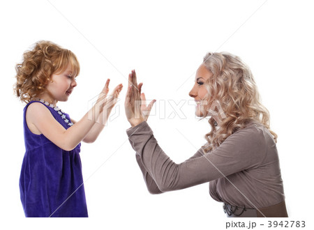 Happy mother and child play together isolated Happy mother and child play together isolated 3942783