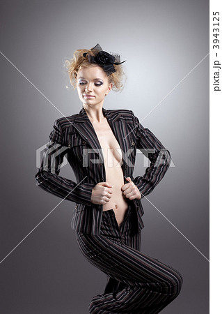 Young beauty woman with nude breast in retro suit - Stock Photo [3943125] -  PIXTA