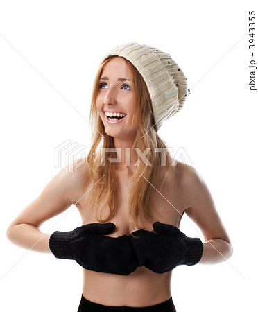 Happy blond woman close breast with mitten Happy blond woman close breast with mitten 3943356
