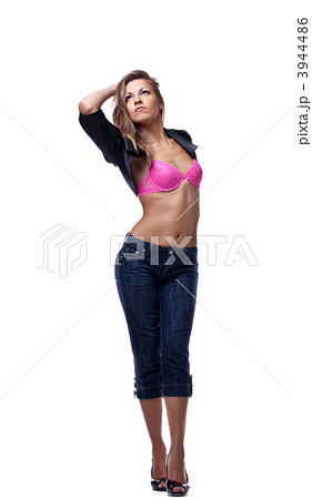 Sexy woman posing in rose bra and black jacket Sexy woman posing in rose bra and black jacket 3944486