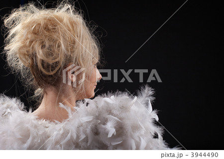 Young woman portrait with small angel wing Young woman portrait with small angel wing 3944490