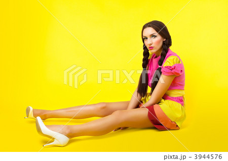 Funny girl in doll costume and make-up Funny girl in doll costume and make-up 3944576